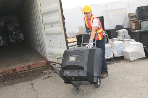 Eco-friendly approach to home clearance in Teddington emphasizing recycling